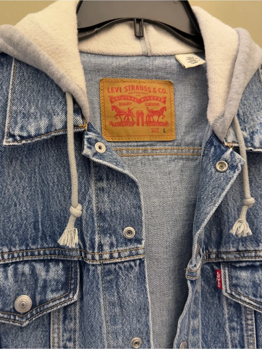Levi's Blue Denim Jacket with Light Gray Hoodie Sleeves